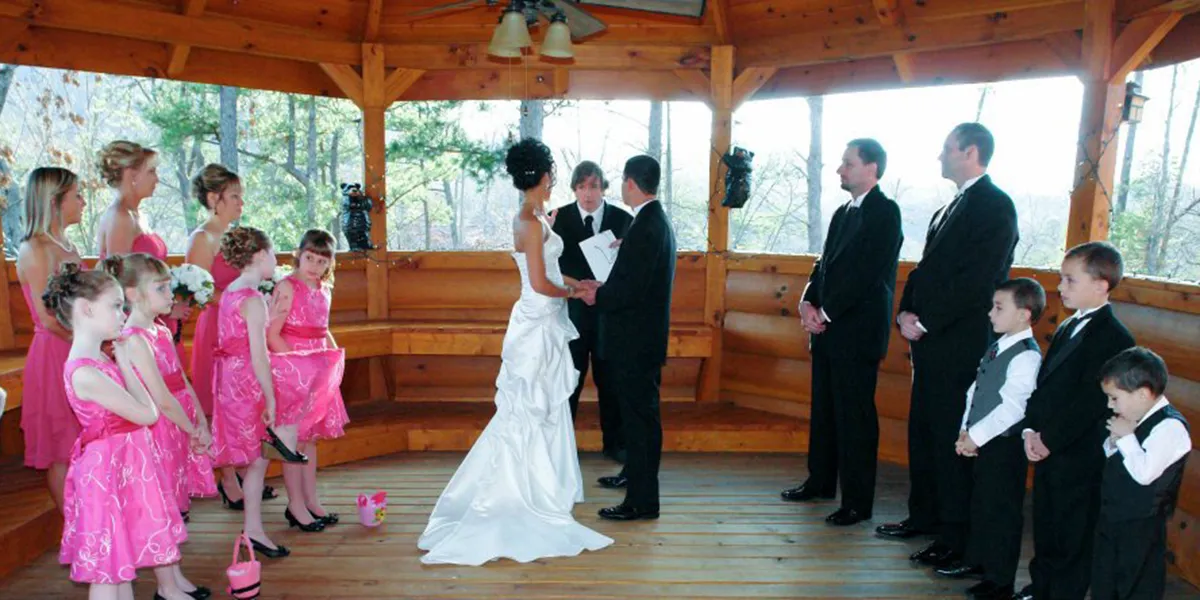 a couple getting married at their own cabin